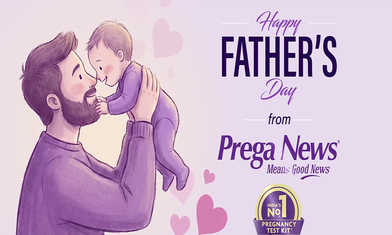Happy Father's Day promotional illustration from Prega News featuring a father lovingly lifting and smiling at his baby, set against a soft pastel background with heart graphics and Father's Day greetings.