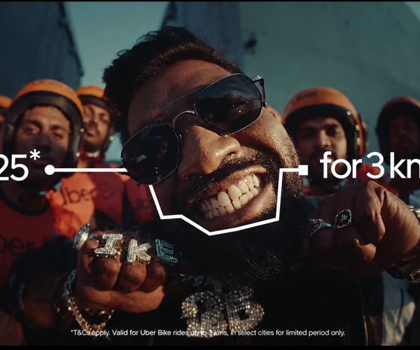 Uber Bike promotional campaign featuring a stylish rider with delivery partners in the background, highlighting the creative strategy that made Uber Bike stand out online with a ₹25 ride offer for 3 kms.