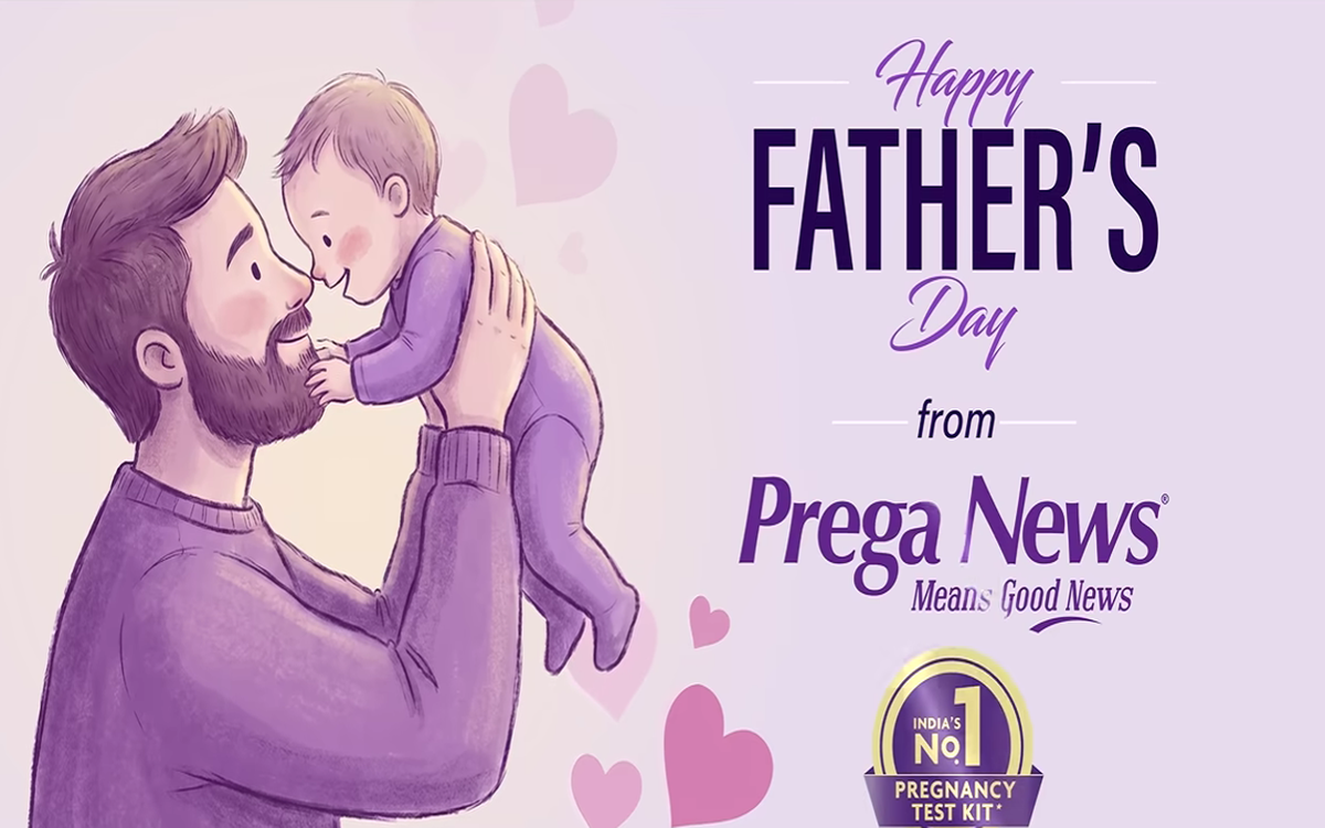 Happy Father's Day promotional illustration from Prega News featuring a father lovingly lifting and smiling at his baby, set against a soft pastel background with heart graphics and Father's Day greetings.