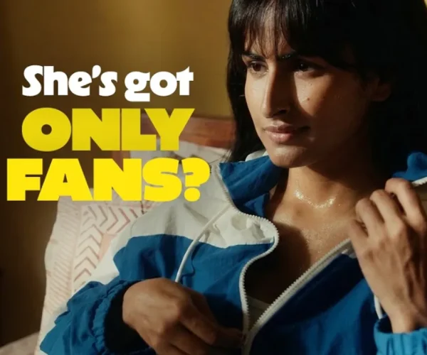 Woman in a blue jacket looking concerned with bold text “She’s got OnlyFans?” highlighting how Flipkart used awkward humor to make a simple product stand out